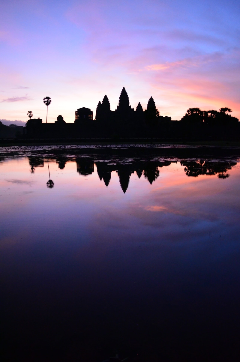 sky, reflection, cloud - sky, water, scenics - nature, rock, gradient, temple, krong siem reap, outdoors, tranquil scene, purple, tree, built structure