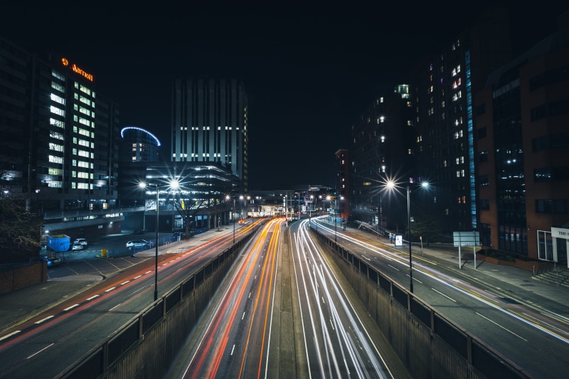 mode of Transport, car, outdoors, downtown District, travel, road between, night, dark, lighting equipment, office building exterior, high, light, concrete