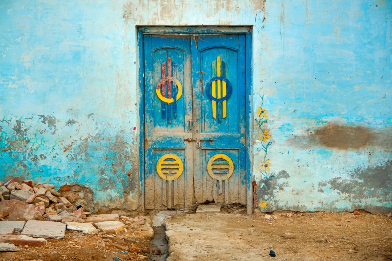 construction, protection, structure, outdoors, city, no people, decoration, urban, carved, building, security, abandoned, india, house, painted, concrete