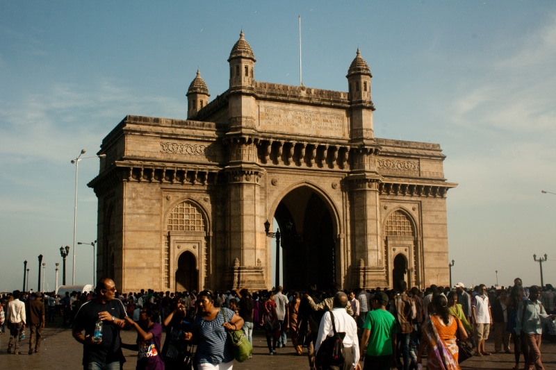 gateway of india, building exterior, travel, real people, large group of people, monument, the past, history, travel destinations, architecture, daytime