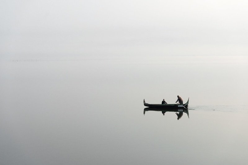sea, transportation, 1080P, landscape, monochrome, copy space, water, sky, real people, gray, day, outdoors, travel, tranquil scene, fisherman, boat, mist