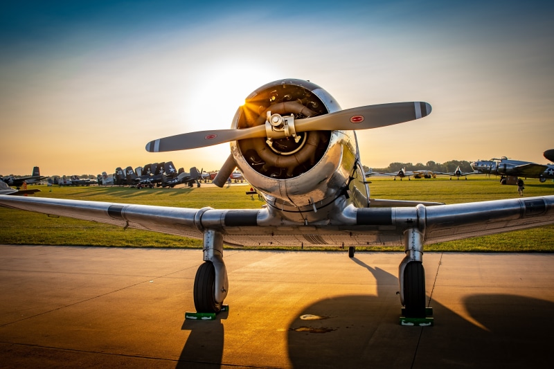 airport runway, vintage, airplane, no people, ww2, flying, outdoors, plane, sky, military, airport, air vehicle, aeroplane, propeller, architecture, travel