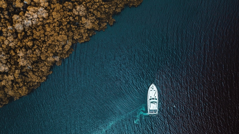 mode of transportation, sunlight, aerial, beauty in nature, beach, nautical vessel, drone photo, nature, outdoors, sea, no people, water, tranquil scene