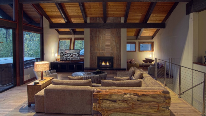 roof beam, flooring, seat, sofa, absence, electric lamp, ceiling, domestic room, wood - material, architecture, luxury, coffee table, furniture, image of beautiful living room with fireplace