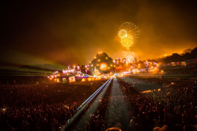 orange, crowd, event, arts culture and entertainment, motion, architecture, group of people, nature, light, firework display, sky, city, Tomorrowland, nightlife