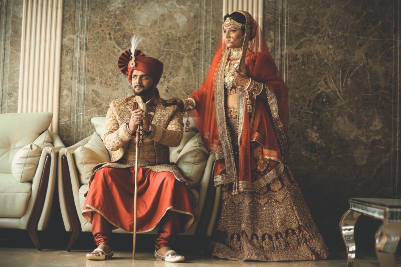 love, bridal gown, front view, traditional clothing, traditional, men, representation, art and craft, sits, engagement, holding, ceremony, seat, left, traditional wear