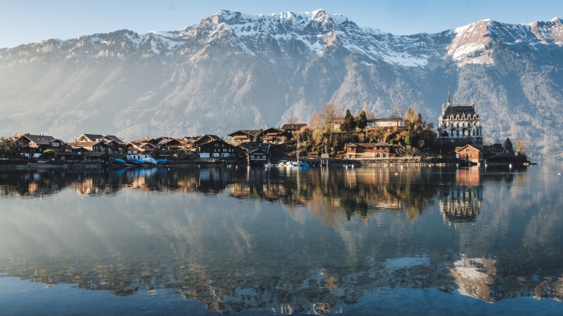 cold temperature, photography, lake, built structure, mountain, mist, reflection, winter, iseltwald, outdoors, snowcapped mountain, building exterior, water