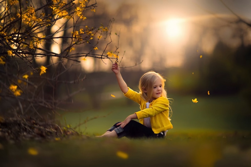 outdoors, innocence, jacket, nature, child, plant part, tree, children, s, 1080P, blond hair, girl, one person, playing, hair, real people, lifestyles