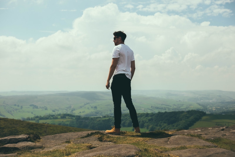person, white, males, landscape, man, cloud - sky, looking, bolder, standing, mountain, one Person, one Man Only, only Men, cliff, mountains, white shirt