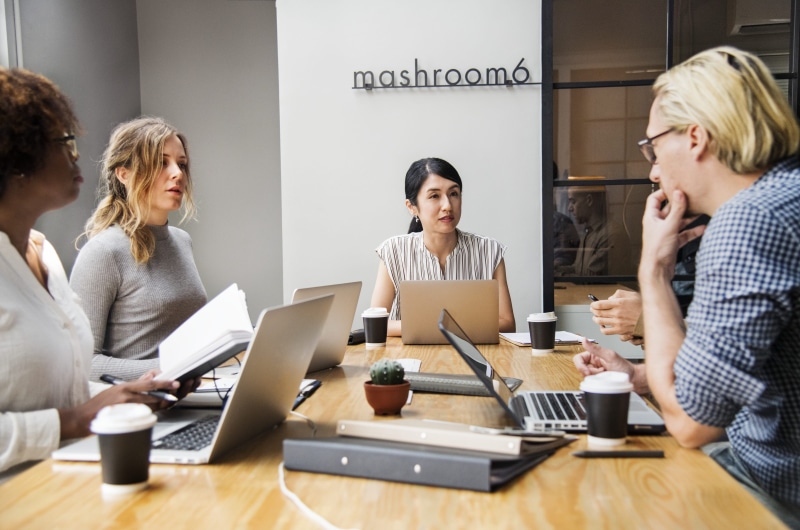 teamwork, discussing, wireless technology, engaging, business person, women, communication, laptop, technology, working, wireless, group of people, businesswoman