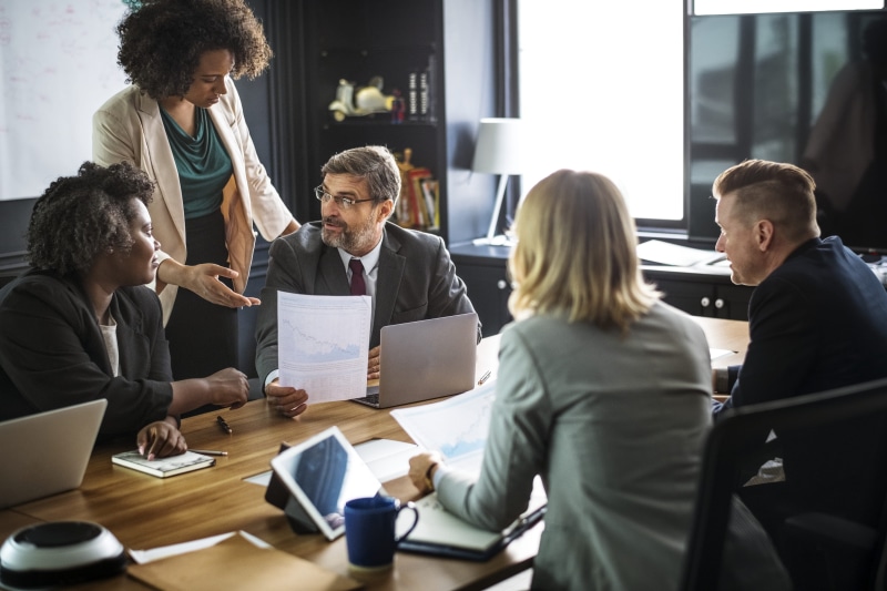 group of people, office, teamwork, wireless technology, businesswoman, technology, boardroom, gathering, furnitures, suit, 4K, facial expression, african descent