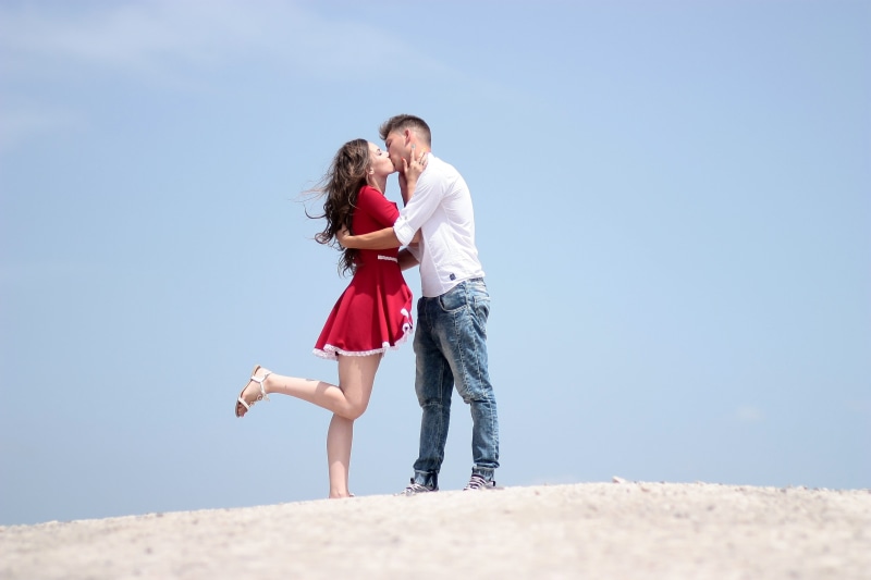 caucasian Ethnicity, couple - Relationship, freedom, daytime, 4K, summer, adult, holding Hands, kissing, smiling, two People, romance, females, leisure activity