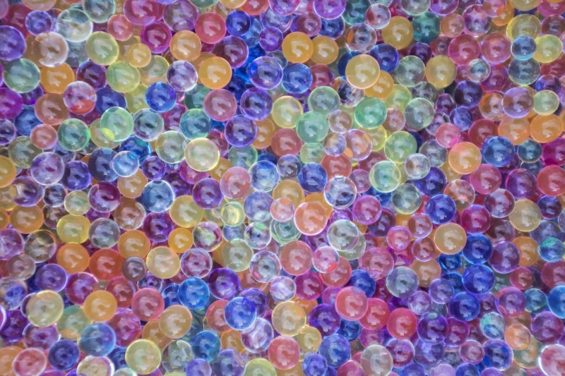 kids, candy, fun, ball, 4K, high angle view, directly above, close-up, blue, background, variation, bubble, shape, toys, random, circle, plastic, large group of objects
