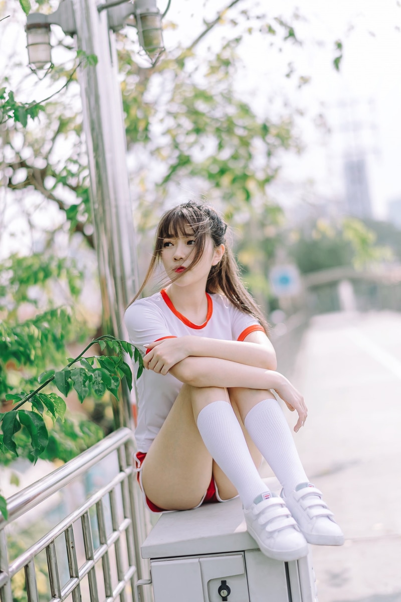 T-shirt, day, short shorts, childhood, front view, one person, beautiful woman, full length, portrait, depth of field, brunette, teenager, looking, model