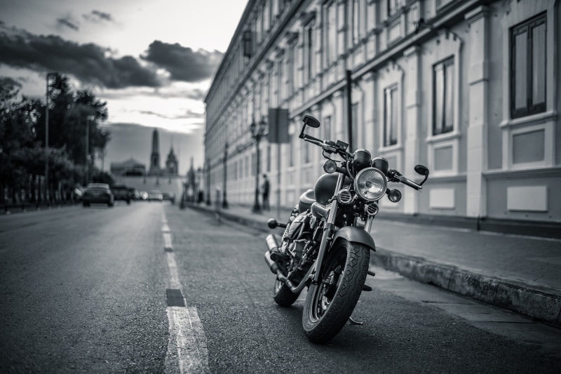 focus on foreground, standard, road, land vehicle, Harley Davidson, outdoors, sky, modified, day, street, riding, nature, mode of transportation, monochrome
