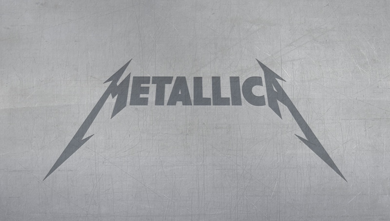 indoors, capital letter, text, metal, band logo, writing, sign, information, warning sign, arrow symbol, no people, western script, gray, white color, music