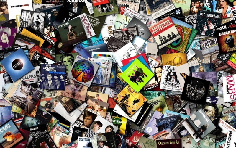 day, 720P, full frame, abundance, large group of objects, obsolete, backgrounds, text, messy, indoors, high angle view, multi colored, assorted, album covers