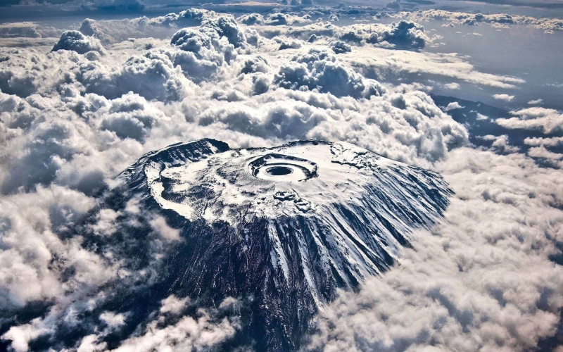 snow, nature, flying, volcano, grey, cloud - sky, snowy peak, white, tranquil scene, plateau, Africa, birds eye view, volcanic crater, high angle view