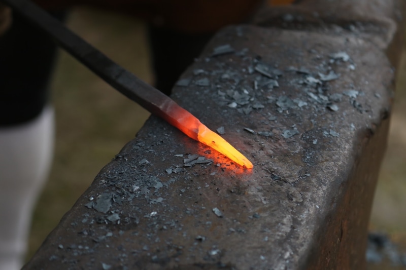no people, hand tool, red, heat, red-hot, metal industry, anvil, flame, day, industry, hot, heat - temperature, close-up, craft, burning, iron, temperature