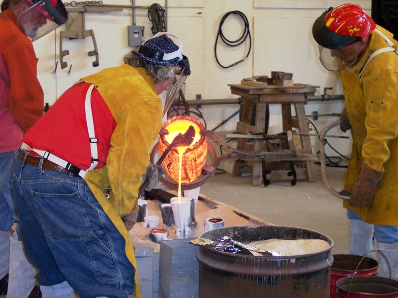 iron, heat - temperature, glow, skill, workshop, adult, manufacturing equipment, coworker, business, preparation, metal industry, flame, artists, fire