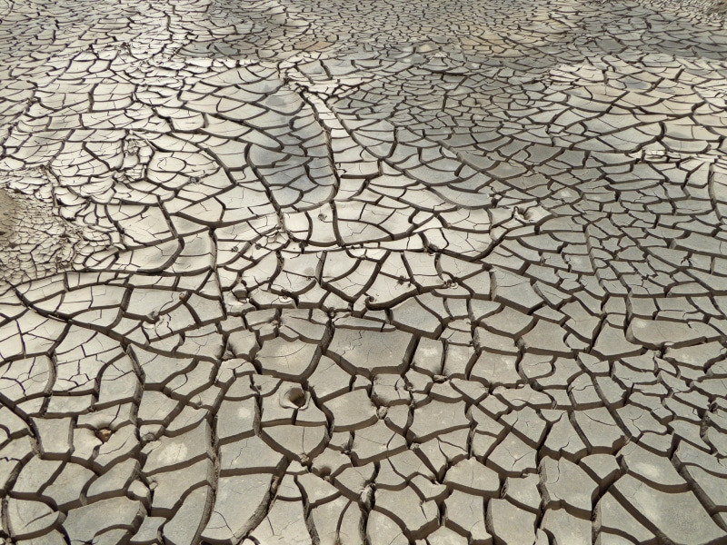 natural Disaster, daytime, no people, natural pattern, cracked, outdoors, sand, extreme terrain, full frame, barren, dehydrated, backgrounds, photo, 1080P