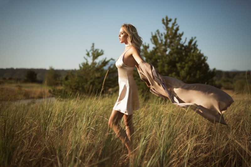 open mouth, blonde, land, one person, plant, full length, closed eyes, long hair, beauty, young women, contemplation, nature, side view, minidress, blond hair