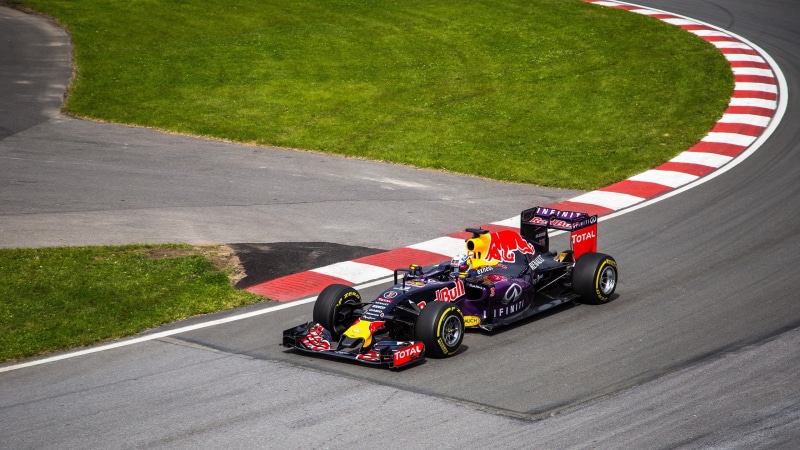 racecar, speed, outdoors, high angle view, day, road, motor racing track, track and field, 2K, transportation, sports race, Red Bull Racing, driving, competitive sport