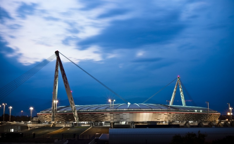 cable-stayed bridge, illuminated, water, outdoors, coliseum, travel destinations, city, Sports, Dusk, blue, cityscape, transportation, connection, arena