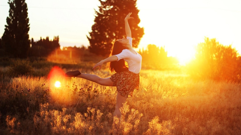 wellbeing, in the sunlight, female, leisure Activity, caucasian Ethnicity, field, young Adult, action, outdoors, sky, dancing, freedom, grass, sunlight