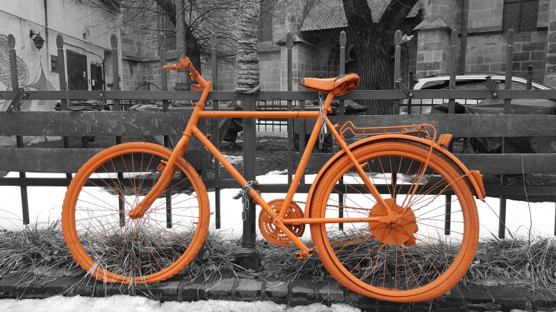 building exterior, health, outdoor advertising, 5K, bike shop, wall, retro styled, street, retro, selective, stationary, made of metal, red, old bike