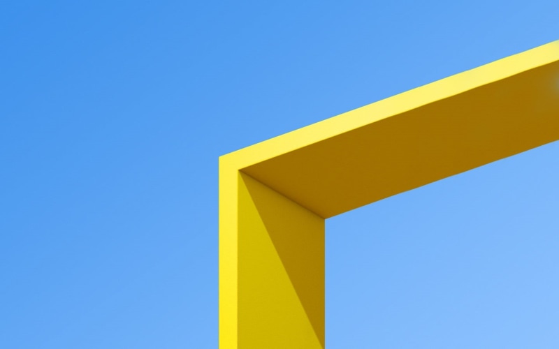 blue, sign, colorful, built structure, sunlight, sunny, shadow, cyan background, outdoors, no people, clear sky, 3D Abstract, copy space, blue background