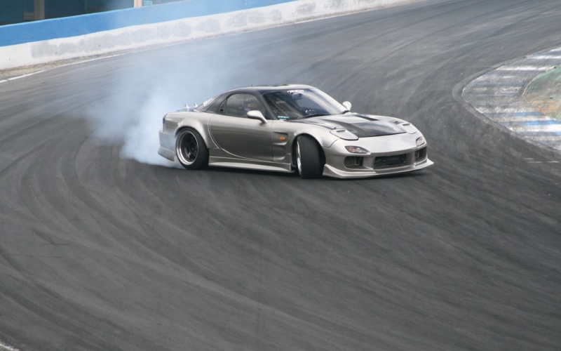 car, competition, blurred motion, auto racing, wheel, Mazda RX-7, sports race, sports car, no people, mode of transportation, speed, luxury, silver, land vehicle