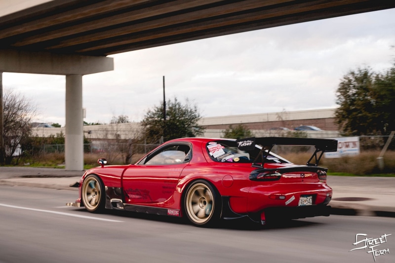 motion, nature, outdoors, car, sports car, tree, red cars, luxury, mode of transportation, architecture, road, sign, plant, day, red, Mazda RX-7, 1080P
