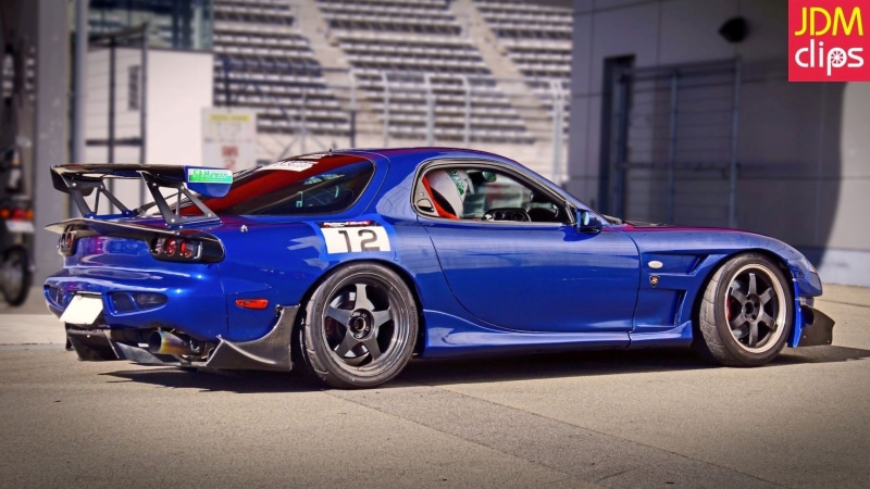 1080P, luxury, communication, day, building exterior, motor vehicle, vintage car, western script, city, JDM, Mazda RX-7, mode of transportation, built structure