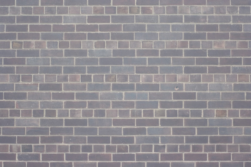 rectangle, in a row, wall - building feature, shape, built structure, pattern, outdoors, textured, no people, repetition, concrete, architecture, city