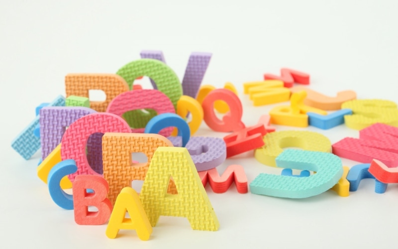 preschool Building, close-up, single Word, toy, no people, multi Colored, text, alphabet, toy Block, many, spelling, yellow, multi-colored, toys, creativity