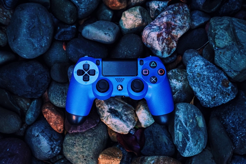 directly above, no people, gaming, equipment, high angle view, communication, technology, nature, textured, Gaming controller, control, outdoors, large group of objects
