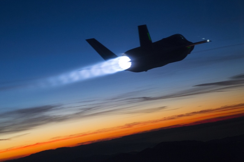 no people, outdoors, transportation, motion, low angle view, jet fighter, Lockheed Martin F-35 Lightning II, cloud - sky, public transportation, mid-air