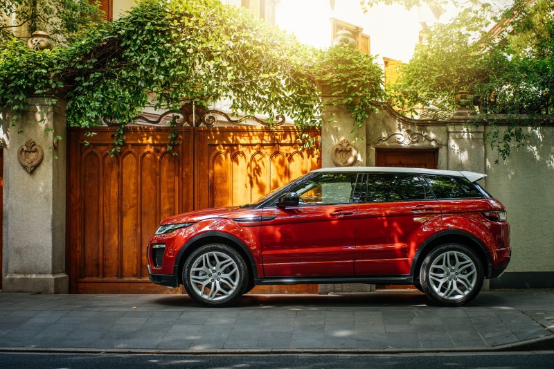 red, mode of transportation, city, tree, architecture, garage, Land Rover, luxury, vintage car, street, rover, car, motor vehicle, land vehicle, day, retro styled