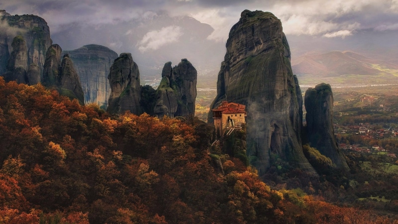 outdoors, wilderness, mountain, environment, rock formation, mountainous landforms, historic, roussanou monastery, plant, monastery, travel, cloud - sky