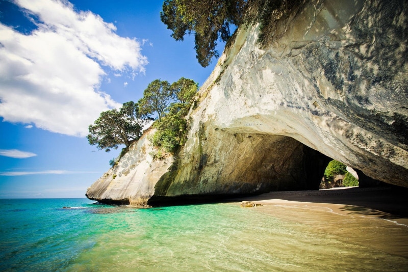 rock, waterfront, cave, tranquility, sea, non-urban scene, nature, rock formation, land, solid, outdoors, body, beach, cloud - sky, 720P, scenics - nature