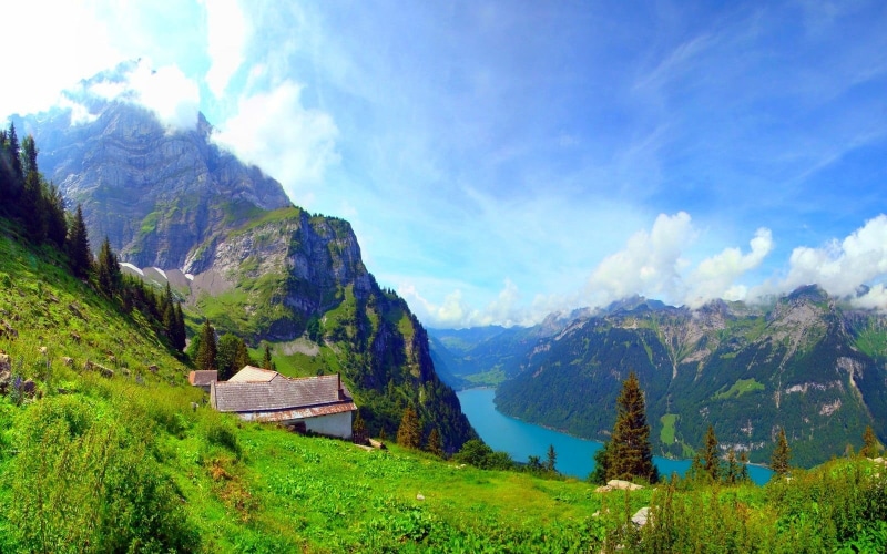 cloud - sky, nature, green color, environment, cottage, field, idyllic, outdoors, panoramic, mountains, scenics - nature, trees, tranquil scene, day, summer