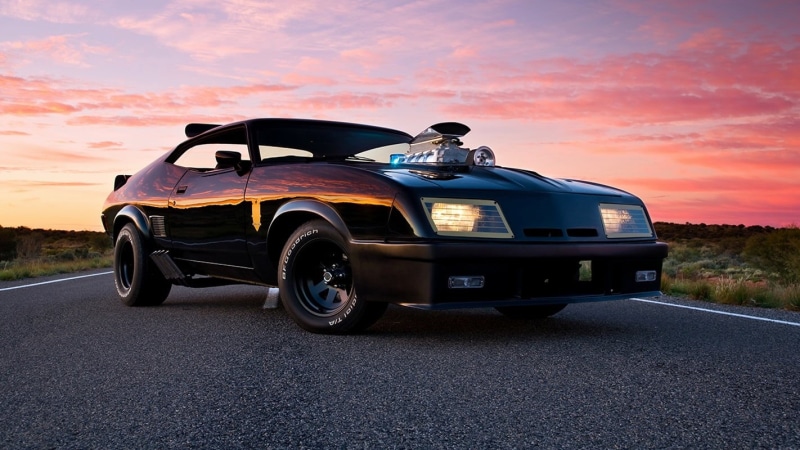 orange color, cloud - sky, transportation, real people, travel, mode of transportation, land vehicle, stationary, sky, lifestyles, road, mad max interceptor