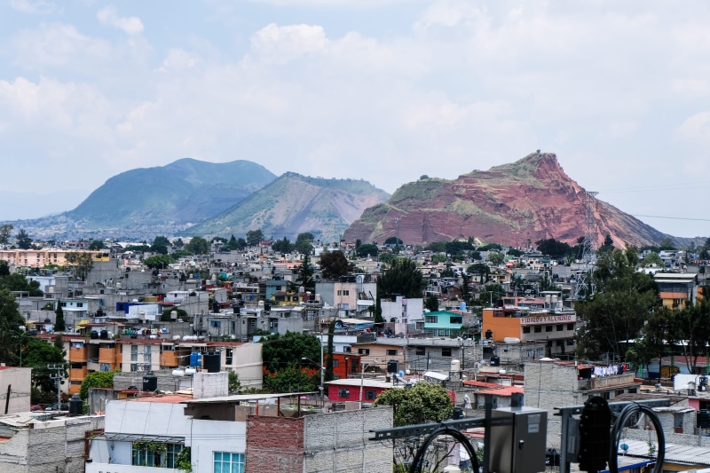 no people, tree, plant, architecture, townscape, residential district, sky, city, mexico, town, cityscape, built structure, ciudad de méxico, day, mountain