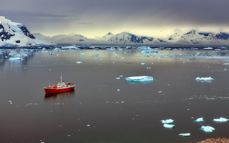 sea, water, frozen, mountain, lagoon, nature, tranquility, mountain range, ship, environment, no people, body, reflection, red, sunlight, clouds, snowcapped mountain