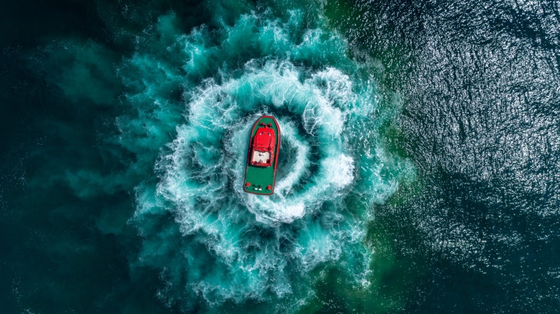 watercraft, nature, splashing, top, directly above, birds eye view, waterfront, ripples, turquoise colored, safety, view, ocean, day, transportation, outdoors