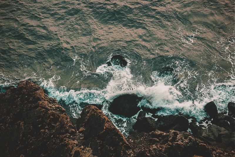 drone photography, drone view, no people, mockup, water, waves, land, beauty in nature, drone shot, rocky, sea, ocean, sport, flowing water