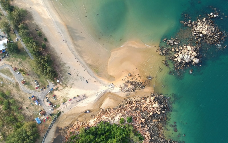 sand, travel destinations, bird, ocean, birds eye view, nature, beach, aerial view, no people, seashore, outdoors, tree, view, environment, beauty in nature