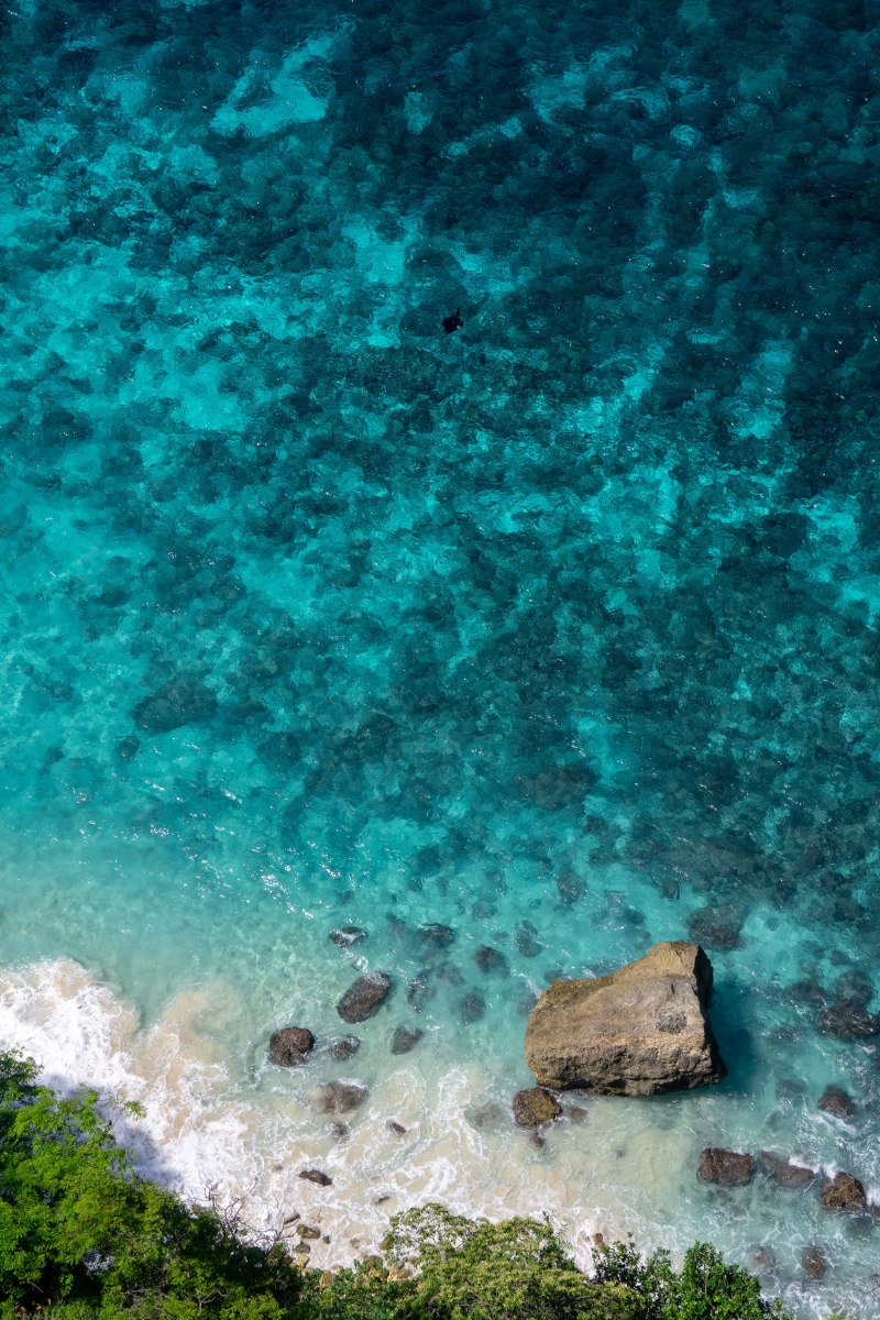 backgrounds, tropical, stone - Object, no People, idyllic, surf, water, day, grass, seascape, sand, sky, scenics, landscape, nature, background, cliff
