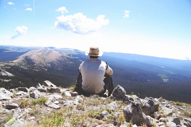 blue sky, rear view, scenics, man, hiking, tranquility, lifestyles, beauty in nature, backpack, tranquil scene, adventure, scenics - nature, non-urban scene